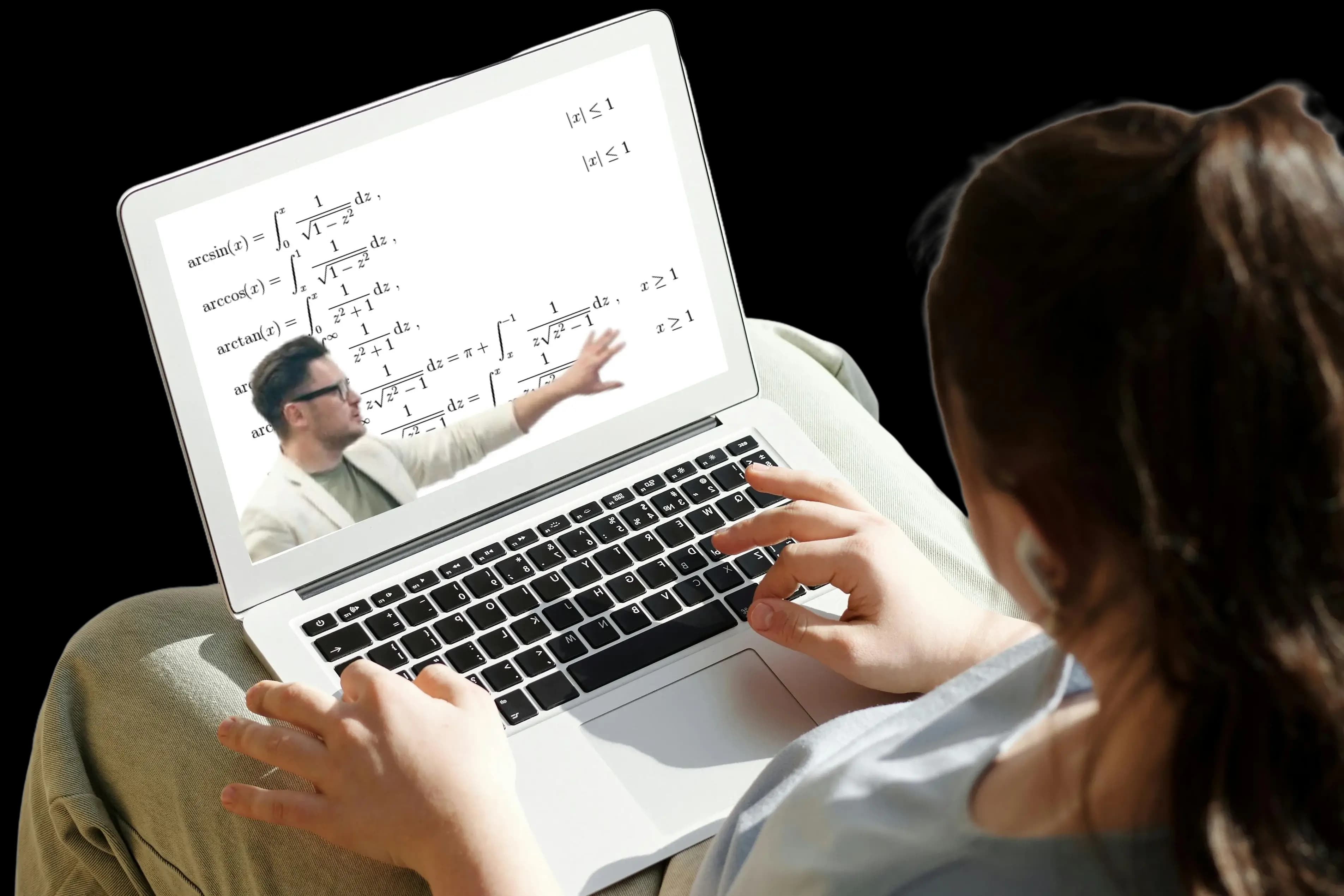 A person studying online while at desk